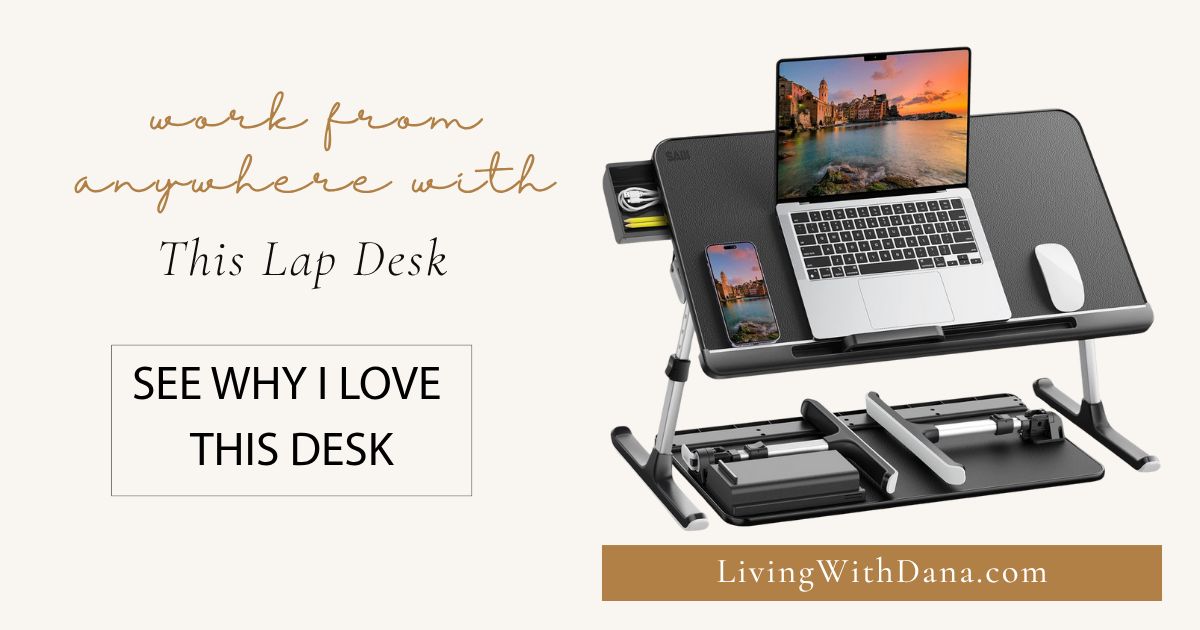 Adjustable black lap desk with laptop and phone placed side-by-side, styled for home workspace